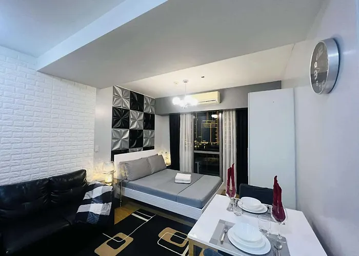 Отель Budget At Acqua Private Residences In Mandaluyong - Rockwell & Pasig River View